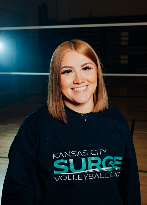 Coach Maddie Holcomb